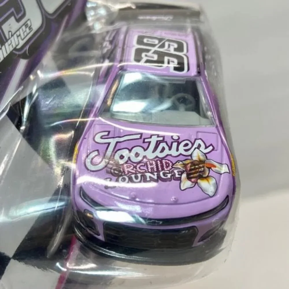 Nascar Authentics Tootsies Daniel Sua'rez 99 Wave 06 SKU-27661 Race Car NIP 2023